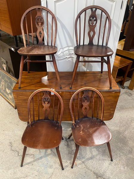 Four Ercol Fleur de Lys Dining Chairs