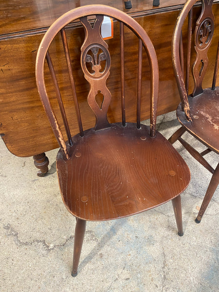 Four Ercol Fleur de Lys Dining Chairs
