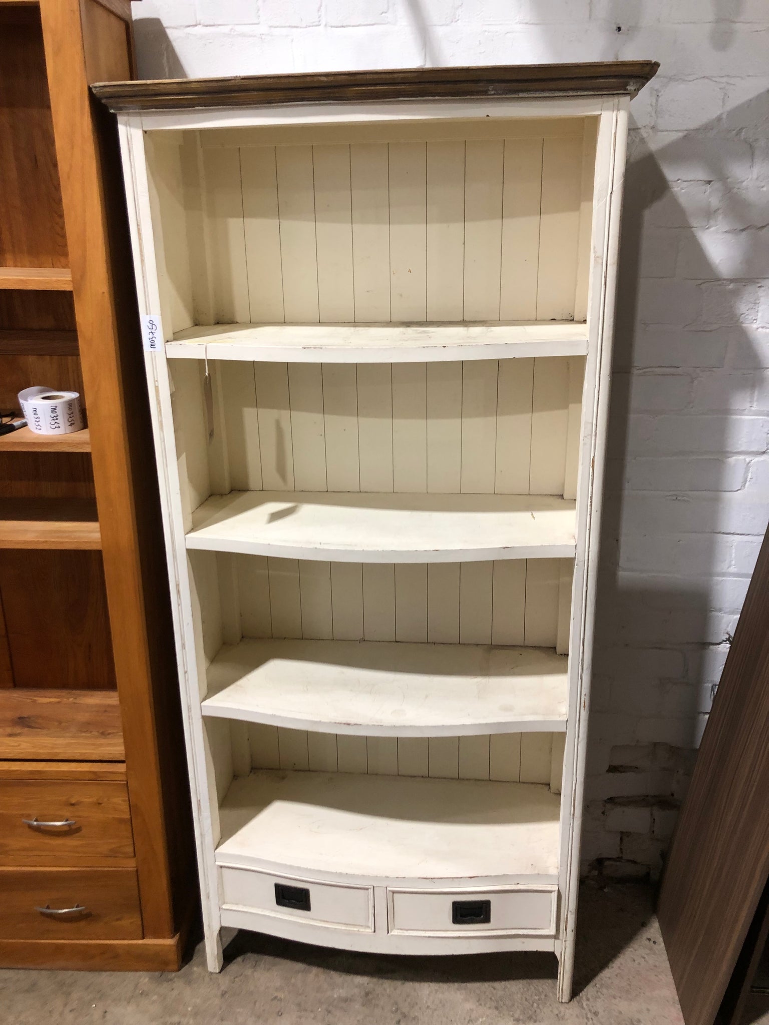 Tall White Wooden Bookshelf with Drawers
