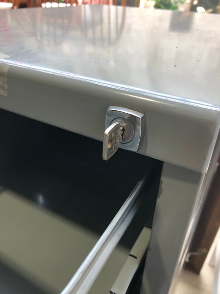 Tall Grey Metal Filing Cabinet