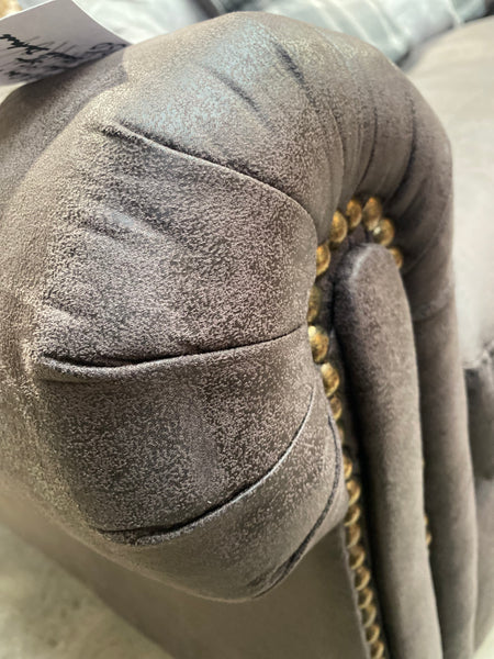 DFS Grey Faux Leather Sofa with Studded Detail