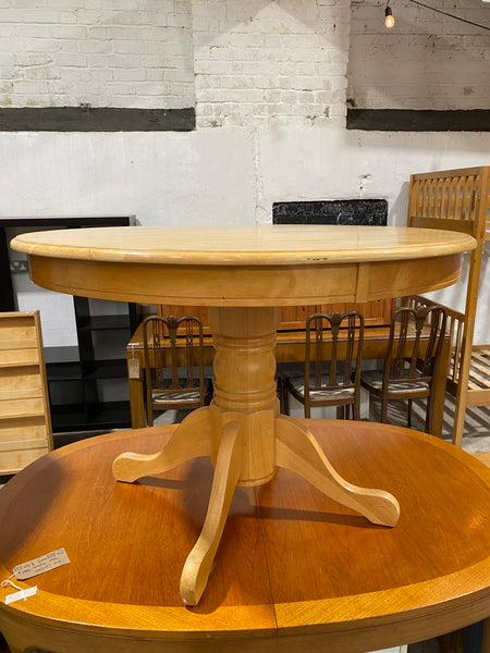 Round Pedestal Table