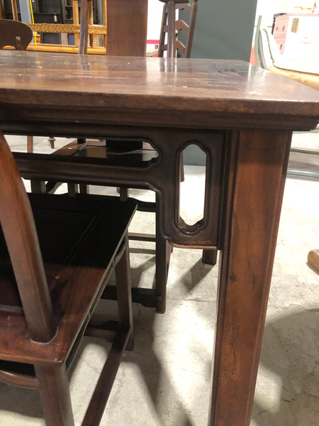 Large six seater dark wooden dining table and chairs