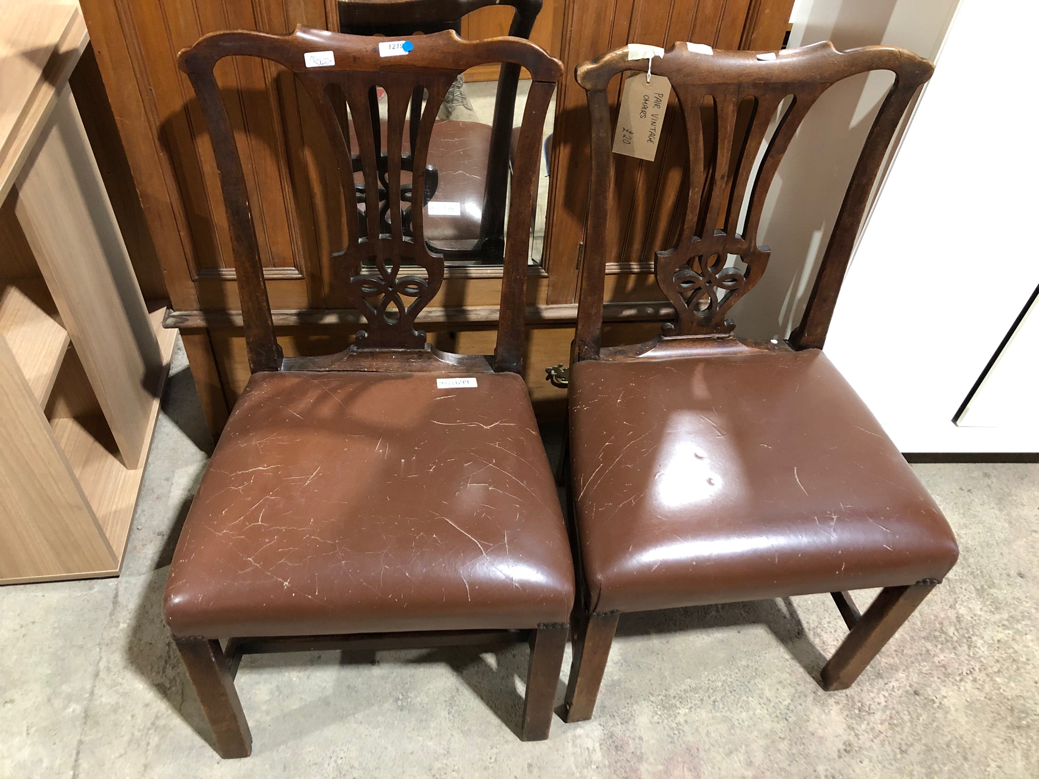 Pair vintage leather style chairs