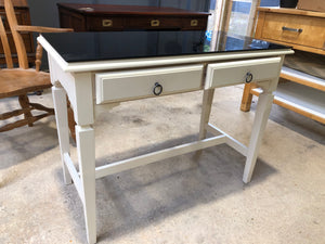 Cream and black console table